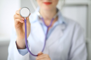 Wall Mural - Doctor with a stethoscope in the hands