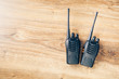 portable radios Walkie-talkie on wooden background