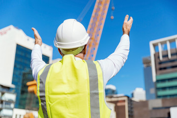 Engineer builder at construction site