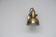 © mettus - Modern wall lamp on white wall, copyspace