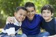 © GM Visuals/Blend Images - Hispanic boys smiling together