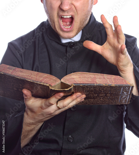 Cuadros en Lienzo Exorcism - the priest with bible