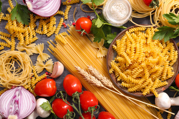Wall Mural - assorted raw pasta and ingredient