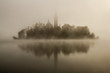 Hazy Morning Reflection at beautiful lake Bled, Slovenia.