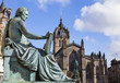 © chrisdorney - David Hume Statue and St Giles Cathedral in Edinburgh, Scotland.