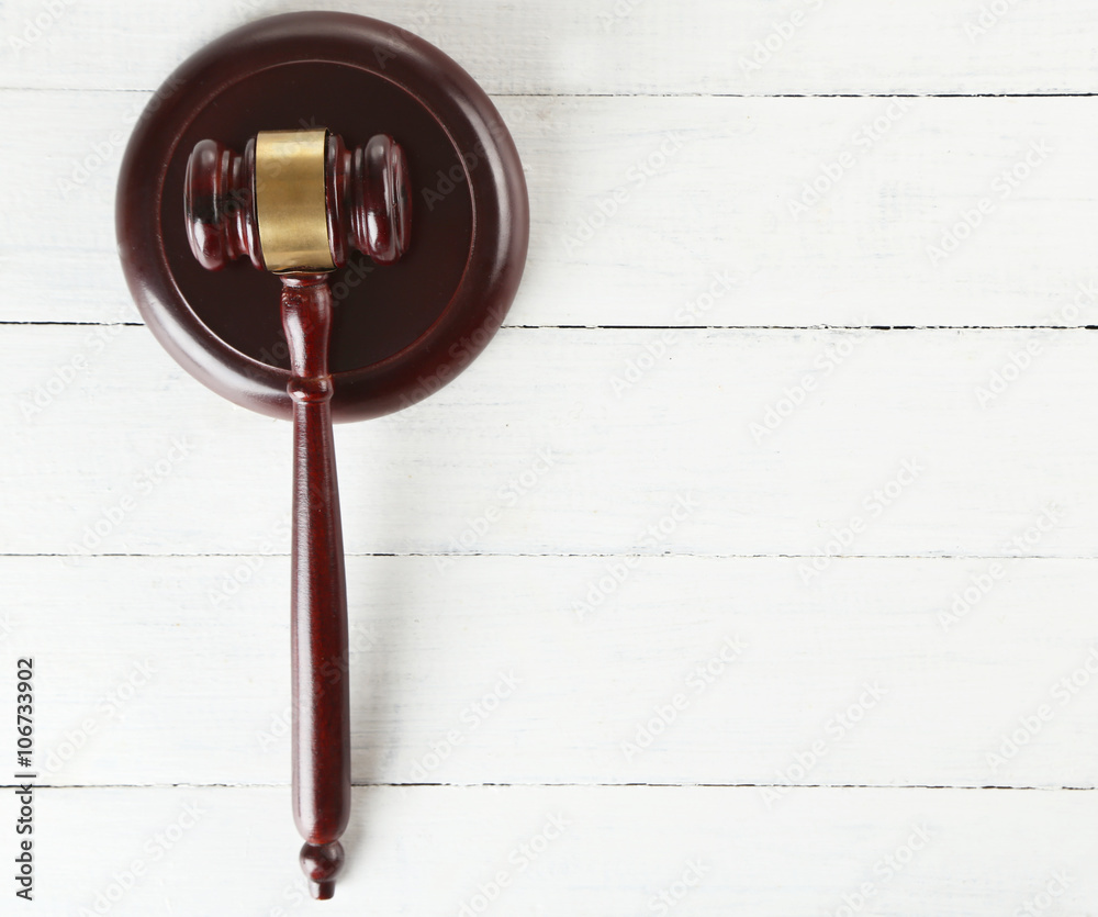Gavel on wooden background