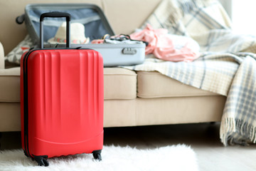 Large red polycarbonate suitcase, close up