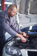 © Westend61 - Car mechanic at work in repair garage