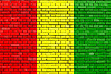 Fototapeta Paryż - flag of Guinea painted on brick wall