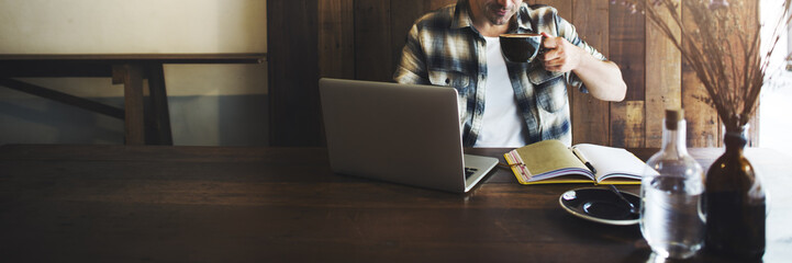 Wall Mural - man relax lifestyle working coffee shop concept