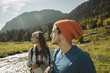 © Westend61 - Austria, Tyrol, Tannheimer Tal, two young hikers watching landscape