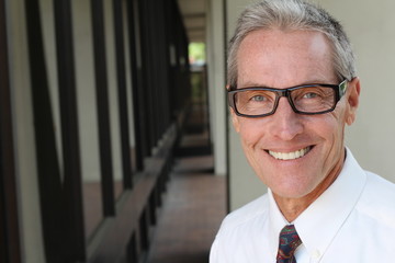 Portrait of a senior manager wearing glasses with copy space for adding text 