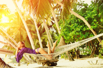 Sticker - Woman in hammock on beach