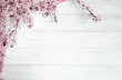 Leinwanddruck Bild - spring background. fruit flowers on wooden table
