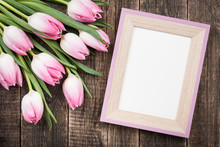 Fresh Pink Tulips And Blank Frame