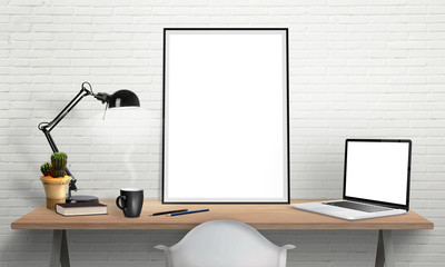Wall Mural - Isolated poster frame and laptop on office desk for mockup. Lamp, cactus, pencils, book, cup of coffee on table.