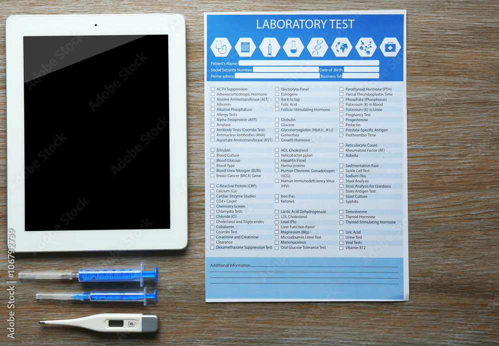 Doctor table with medicines and tablet, top view