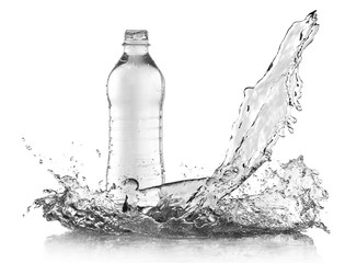 Poster - Splashing water onto bottle over grey background