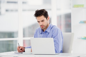 Aufkleber - Businessman writing in diary