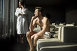 © BGStock72 - Man with a towel in a room