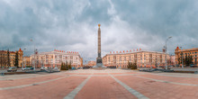 Monument In Honor Of The Victory In World War II At Victory Square In Minsk, Belarus. Panorama. Red Letters Read Heroic Deed Of The People Is Immortal