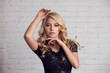 © Dmitri Strakhov - Beautiful model blond with long curled hair