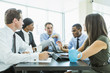 © Mike Kemp/Blend Images - Business people talking in meeting