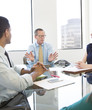 © Sam Diephuis/Blend Images - Business people talking in meeting