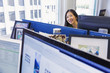 © Don Mason/Blend Images - Japanese businesswoman working at computer in office