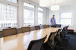 © Don Mason/Blend Images - Businessman standing at table in conference room