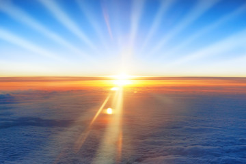 Wall Mural - sun, sunset, blue sky, and ocean of clouds