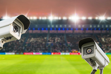 CCTV security in stadium football at twilight background.