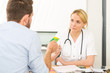 © Production Perig - Young attractive woman doctor taking health insurance card