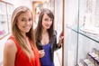 © WavebreakmediaMicro - Portrait of two beautiful women in a store