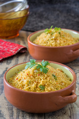 Wall Mural - Couscous with vegetables on wood
