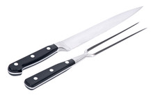 Carving Knife And Fork Separated On White Background