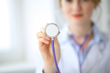 Wall Mural - Doctor with a stethoscope in the hands