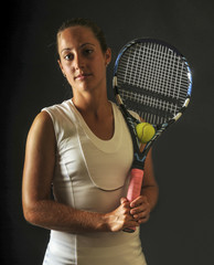 Portrait of beautiful young pro tennis player