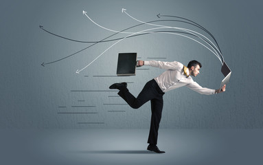 Running businessman with device and hand drawn lines