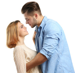 Wall Mural - Young couple in love embracing, isolated on white