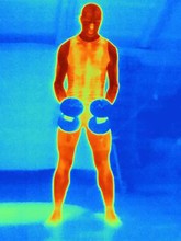 Front View Thermal Image Of Young Man Training With Barbells. The Image Shows The Heat Produced By The Muscles