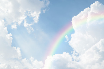 blue sky cloud with rainbow