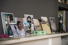 Living Room Mantelpiece With Travel Souvenirs And Photographs