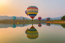 Hot Air Color Balloon Over Lake With Sunset Time, Chiang Rai Province, Thailand