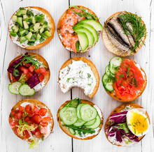 Small Sandwiches On Wooden Background