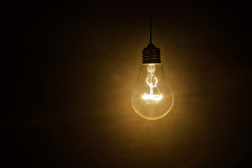 Wall Mural - light bulb on dark background