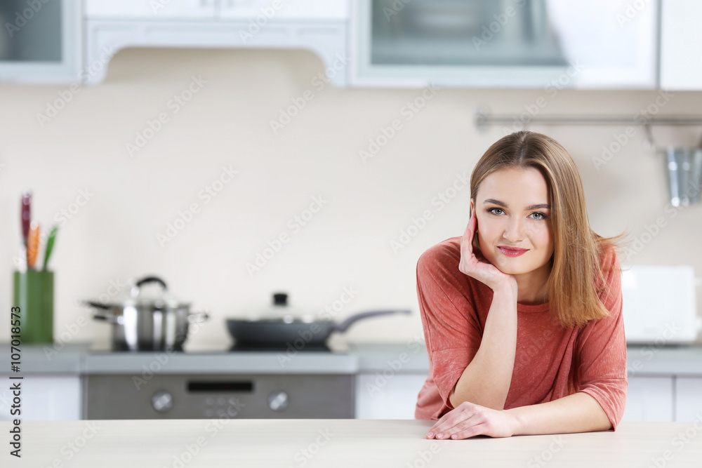 Young woman in the kitchen