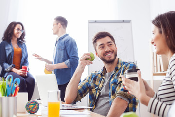 Skillful four colleagues are resting in office