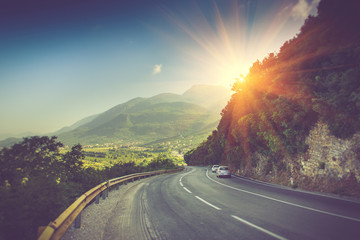 View of the road bend and a mountain range near Budva, Montenegro.