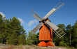 red wooden windmill